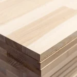 Detailed close-up of the corner and edge of a 20mm finger-jointed ash board.