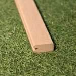 General view of the wooden decorative grid U-shaped profile Alder on grass