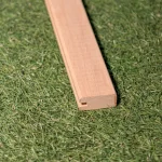 End part of the U-shaped profile of the wooden grid