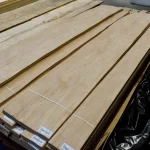 Sheets of exclusive 3D Rough Cut oak veneer stacked in packs on a pallet