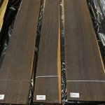 Three sheets of exclusive smoked oak veneer laid out on film