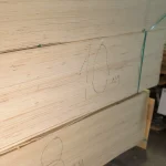 Handwritten 10 mm marking on the edge of FK birch plywood stack