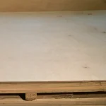 Stack of water-resistant FK plywood 9 mm on a wooden pallet.