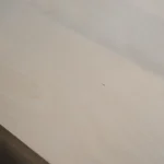 Smooth light surface of a 3 mm FK plywood sheet at an angle