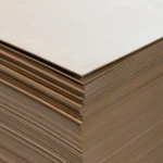 Edges of 4 mm thick FC plywood sheets in a stack