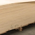 Warehouse storage of 4 mm FC plywood with markings on the pack
