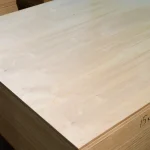 Stack of birch FK plywood 15 mm with dimensions 2.5x1.25 m in warehouse
