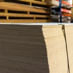 Warehouse pallet of FC plywood 6 mm B/BB, strapped for safe transportation.