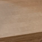Stack of 13 mm birch veneered plywood sheets in the warehouse.