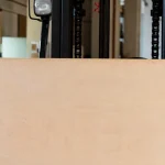 Veneered birch plywood 13 mm with a forklift in the background.