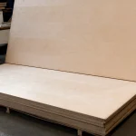 Pallet with sheets of 22 mm B/B grade birch veneered plywood in the warehouse.