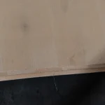 Cut edge of white ash veneered plywood 5 mm