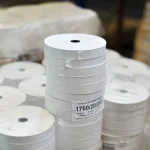 Stack of Kuper veneer tape rolls with 1760/20/200 label