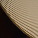 Close-up of milled strips on flexible MDF