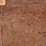 Unique texture of Amboyna burl veneer with distinctive pattern