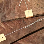Edge of Amboyna burl veneer pack with paper tag