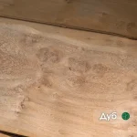 A sheet of oak burl veneer 0.6 mm thick with a distinct root texture.