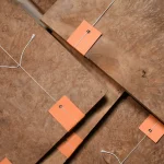 Selected bundles of Madrone burl veneer (root cuts) prepared for shipping