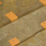Wavy grain and unique fiber pattern of Myrtle root veneer.