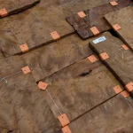 Bundle of Vavona burl veneer secured with orange clips