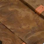 Close-up texture of Vavona burl veneer showing rich natural wood grain