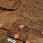Detailed view of Vavona burl veneer sheets with orange tags