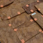 Laid out Vavona burl veneer packs with barcodes and tags