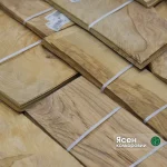 Packs of olive ash burl veneer 0.6 mm thick at the WoodWay Expert warehouse.
