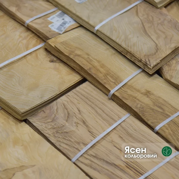 Packs of olive ash burl veneer 0.6 mm thick at the WoodWay Expert warehouse.
