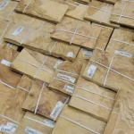 Stack of olive ash burl veneer sheets, 0.6 mm