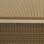 Macro texture of the grooved flexible MDF surface and pack edge