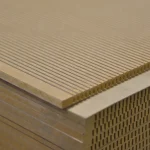 Edge of flexible MDF and the corner of a board stack
