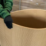 Bent sheet of flexible MDF at production