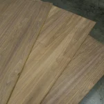 Three MDF sheets veneered with American Walnut 19 mm, fanned out