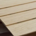 Close-up of the edges of 4 mm MDF boards veneered with sawn oak veneer