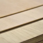 Texture of sawn oak veneer on the surface of a 4 mm MDF board