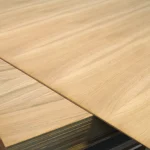 Corner of stacked oak-veneered MDF boards 6 mm