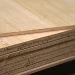 Edge cut of veneered MDF board 9 mm, view of the material structure