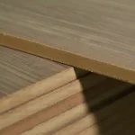 Edge of 19 mm MDF board veneered with American Walnut