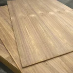 Two veneered MDF boards American Walnut lying on top of each other