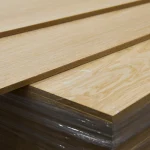 Close-up of the edge of 17 mm oak veneered MDF board