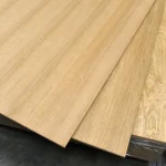 Surface of MDF board covered with Grade I/II sawn oak veneer