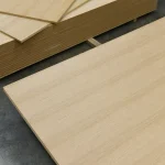 Pack of MDF boards veneered with sawn oak veneer in the warehouse.