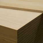 Corner of stacked MDF boards with sawn oak veneer, 26 mm thickness.