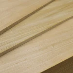 Close-up of the edges of 26 mm oak veneered MDF boards.