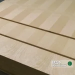 Veneered MDF board with white ash 9 mm thick in a stack