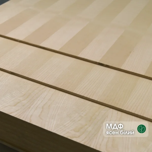 Veneered MDF board with white ash 9 mm thick in a stack