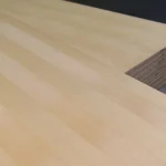 Corner of a 9 mm MDF board veneered with white ash