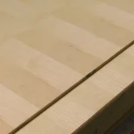 Detailed view of white ash veneered MDF texture