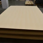 Sheet of veneered MDF white ash 2800x2070 mm on a pallet